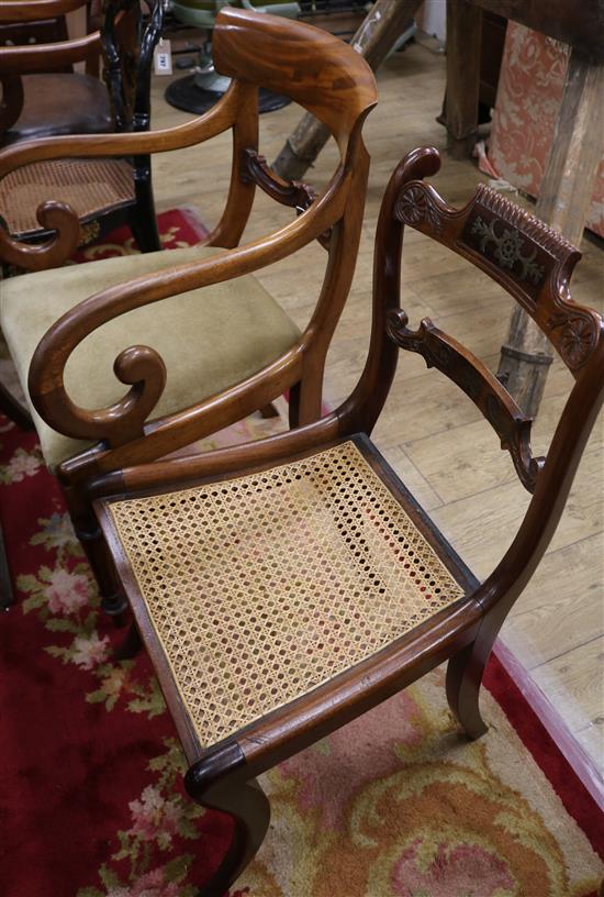 A Regency rosewood dining chair, with two scrolls and gadrooned brass inlaid horizontal rails to the back,